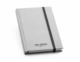 Caderno capa dura com 80 folhas na cor marfim com elástico e fita marca página. Com 80 folhas pautadas.