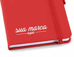 Caderno em couro sintético, com porta esferográfica e 80 folhas não pautadas