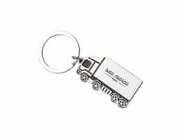 Chaveiro metal com chapa em formato caminhão brilhante, possui detalhes preto em relevo na frente e verso liso.