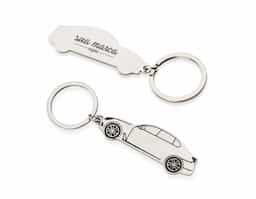 Chaveiro metal formato carro com detalhes preto em relevo e verso espelhado.																										
