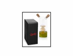 Galheteiro em vidro que contém dois reservatórios com capacidades de até 50 ml e de até 250 ml. O galheteiro contém duas rolhas de cortiça.