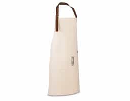 Avental em 100% algodão canvas (320 g/m²) com detalhes em metal. Com 3 bolsos multifuncionais e uma tira lateral (para suporte de um pano de cozinha). Tira do pescoço facilmente ajustável