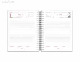 Agenda Wire-o com Capa Prime preta, decorada com uma estampa motivacional. Modelo diário 2025, oferece páginas datadas para organização de tarefas e compromissos. Possui encadernação resistente e design compacto, ideal para uso pessoal ou profissional.