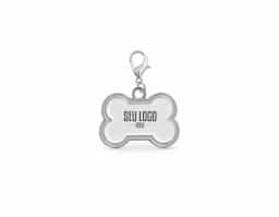 Chaveiro em formato de osso, com medidas de 32 x 22 x 2 mm. É ideal para identificar animais de estimação, oferecendo um acessório prático e funcional para personalização e fácil reconhecimento.