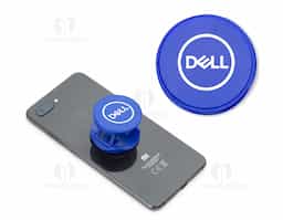 Suporte retrátil para celular em material plástico com verso adesivado (3M). Utilização como "anel anti-furto" ou suporte de sustentação para o celular.