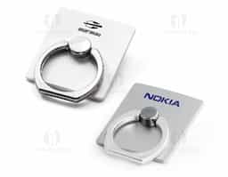 Suporte de anel para celular confeccionado em ABS resistente, proporcionando maior segurança e conforto no manuseio do aparelho. Possui autocolante no verso, garantindo fixação prática e firme. Versátil e funcional, auxilia no apoio do celular e é uma excelente opção de brinde corporativo moderno e útil.