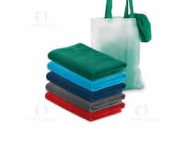 Toalha de praia em veludo de algodão (320 g/m²), disponível em várias cores. Fornecida com sacola em non-woven (80 g/m²). 1500 x 750 mm | Sacola: 330 x 415 x 100 mm