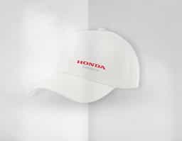 Boné modelo 6 gomos, confeccionado em tecido brim flextop 100% algodão, parte interna com entretela e acabamento com carneira em brim , botão encapado , fechamento com regulador em velcro .