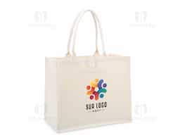 Resistência e design minimalista. Nossa sacola de lona é a escolha ideal para quem busca robustez com estilo moderno. Com alças reforçadas e estrutura de 474g/m², essa sacola oferece ampla profundidade, perfeita para transportar diversos itens sem comprometer a resistência.