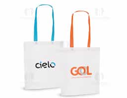Sacola em non-woven (80 g/m²) termo-selado com alças de 55 cm. 330 x 390 x 80 mm